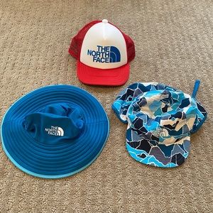 3 The North Face infant hats